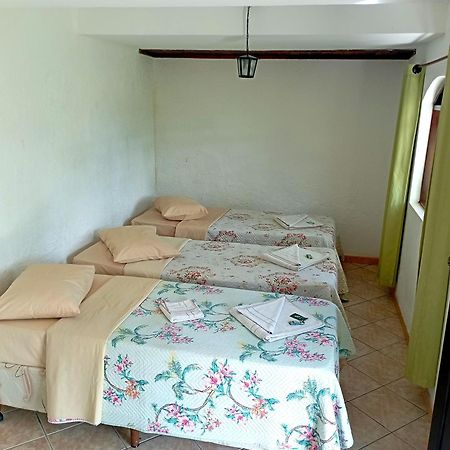 Pousada Nossa Senhora Penedo  Zewnętrze zdjęcie A bedroom in a hostel